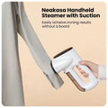 steam iron with a garment suction